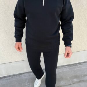 385079